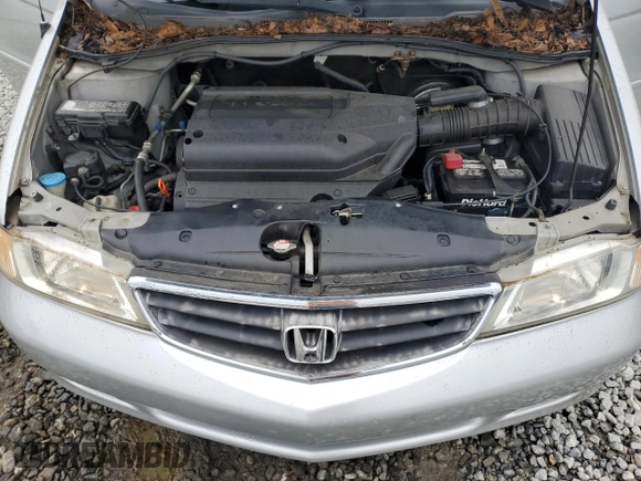 2004 Honda Odyssey EX-L with VIN 5FNRL18044B069774, listed as a Copart auction lot 57096535 with 165,307 mi miles and Salvage title. Bid and sale history available at DreamBid. Image 12.