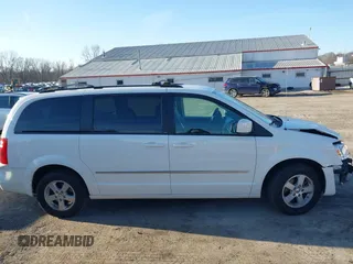 2010 Dodge Grand Caravan SXT with VIN 2D4RN5DX8AR239352, listed as a IAAI auction lot 41773487 with 86,084 mi miles and . Bid and sale history available at DreamBid. Image 13.