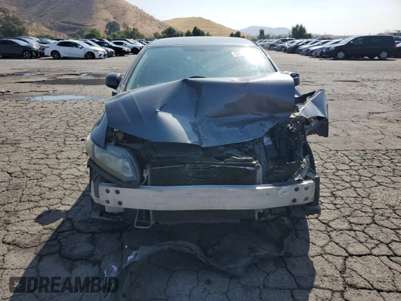 2013 Honda Civic LX z VIN 19XFB2F51DE275750, wystawiony jako Copart lot #59807025 z przebiegiem 134 691 mil mil oraz Szkoda całkowita • Salvage title. Historia ofert i sprzedaży dostępna na DreamBid. Obrazek 5.