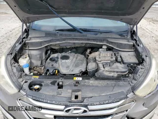 2013 Hyundai Santa Fe Sport z VIN 5XYZU3LB9DG014666, wystawiony jako Copart lot #57304515 z przebiegiem 148 369 mil mil oraz Szkoda całkowita • Salvage title. Historia ofert i sprzedaży dostępna na DreamBid. Obrazek 11.