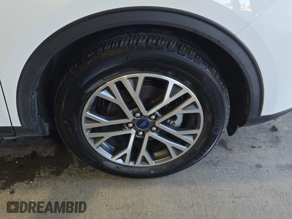 2021 Ford Escape SEL Hybrid with VIN 1FMCU9CZ1MUB25597, listed as a IAAI auction lot 42663573 with 79,061 mi miles and . Bid and sale history available at DreamBid. Image 37.