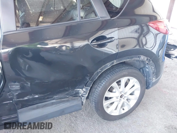 2013 Mazda CX-5 Grand Touring with VIN JM3KE2DE4D0127827, listed as a IAAI auction lot 41817214 with 108,295 mi miles. Bid and sale history available at carsss.com. Image 6.