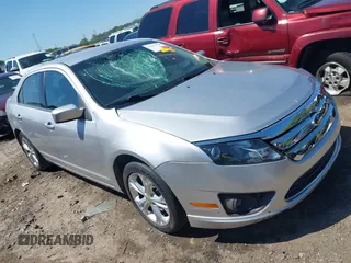 2012 Ford Fusion SE with VIN 3FAHP0HA6CR321255, listed as a IAAI auction lot 41971706 with 114,977 mi miles and . Bid and sale history available at DreamBid. Image 1.