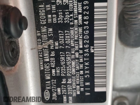 2013 Kia Sorento LX z VIN 5XYKT3A62DG348239, wystawiony jako Copart lot #52022165 z przebiegiem Nie podano mil oraz Szkoda całkowita • Salvage title. Historia ofert i sprzedaży dostępna na DreamBid. Obrazek 14.