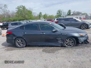 2020 Kia Optima LX with VIN 5XXGT4L3XLG399702, listed as a IAAI auction lot 42092023 with 70,861 mi miles and . Bid and sale history available at DreamBid. Image 14.