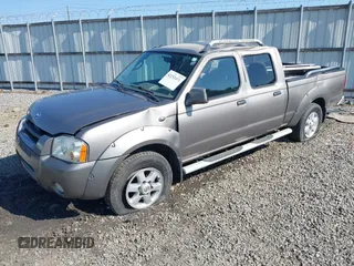 2003 Nissan Frontier SE z VIN 1N6ED29X43C402027, wystawiony jako IAAI lot #42252471 z przebiegiem 104 233 mil mil oraz . Historia ofert i sprzedaży dostępna na DreamBid. Obrazek 2.