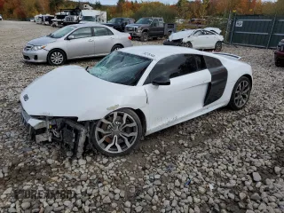 2010 Audi R8 5.2L z VIN WUAANAFG9AN001607, wystawiony jako Copart lot #76276144 z przebiegiem 68 700 mil mil oraz Szkoda całkowita • Salvage title. Historia ofert i sprzedaży dostępna na DreamBid. Obrazek 1.