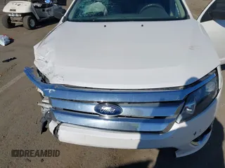 2012 Ford Fusion SEL with VIN 3FAHP0JG8CR266516, listed as a IAAI auction lot 42150556 with 141,715 mi miles and . Bid and sale history available at carsss.com. Image 6.