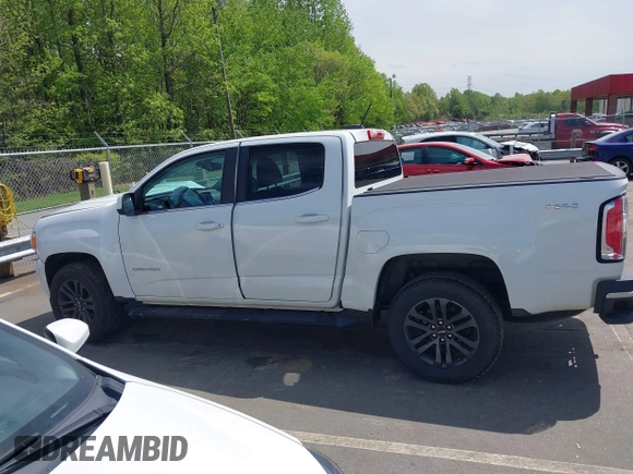 2019 GMC Canyon 4WD SLE z VIN 1GTG6CENXK1319647, wystawiony jako IAAI lot #42039568 z przebiegiem 56 371 mil mil oraz . Historia ofert i sprzedaży dostępna na DreamBid. Obrazek 15.