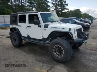 2010 Jeep Wrangler Unlimited Rubicon with VIN 1J4BA6H10AL176014, listed as a Copart auction lot 57092255 with 138,253 mi miles and Salvage title. Bid and sale history available at DreamBid. Image 4.