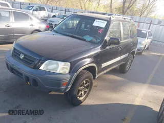 2000 Honda CR-V EX with VIN JHLRD1866YC025833, listed as a IAAI auction lot 42039440 with 238,599 mi miles. Bid and sale history available at carsss.com. Image 2.