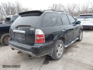 2005 Acura MDX Touring with VIN 2HNYD186X5H524999, listed as a IAAI auction lot 41506033 with 252,064 mi miles. Bid and sale history available at carsss.com. Image 4.