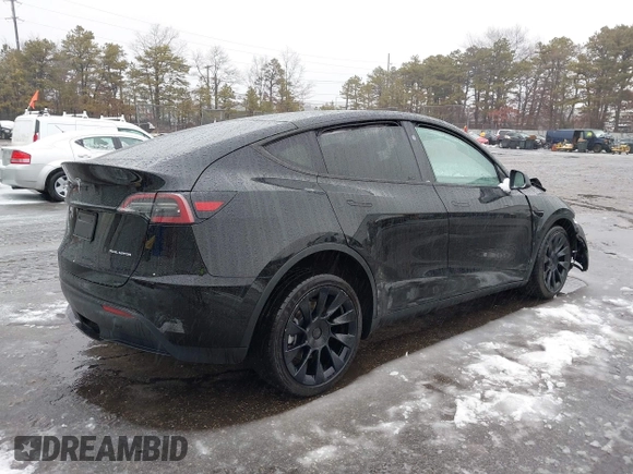 2023 Tesla Model Y Long Range with VIN 7SAYGDEE8PA183301, listed as a IAAI auction lot 41498769 with 82,893 mi miles and . Bid and sale history available at carsss.com. Image 4.