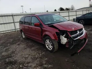 2015 Dodge Grand Caravan SXT with VIN 2C4RDGCG3FR625083, listed as a Copart auction lot 42409455 with 117,217 mi miles and Salvage Title. Bid and sale history available at DreamBid. Image 12.