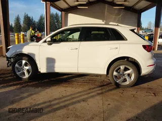 2021 Audi Q3 Premium with VIN WA1AUCF37M1087692, listed as a IAAI auction lot 41277380 with 66,039 mi miles and . Bid and sale history available at DreamBid. Image 15.
