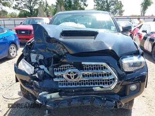 2017 Toyota Tacoma SR5 z VIN 5TFAZ5CNXHX048879, wystawiony jako IAAI lot #42157227 z przebiegiem 119 932 mil mil oraz . Historia ofert i sprzedaży dostępna na DreamBid. Obrazek 12.