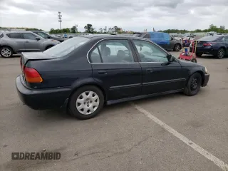 1998 Honda Civic LX with VIN 2HGEJ667XWH522537, listed as a Copart auction lot 49333155 with 261,684 mi miles and Non Repairable. Bid and sale history available at carsss.com. Image 3.