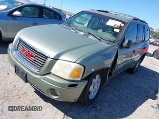 2003 GMC Envoy SLT with VIN 1GKDS13S432373988, listed as a IAAI auction lot 41840744 with 221,306 mi miles. Bid and sale history available at carsss.com. Image 2.