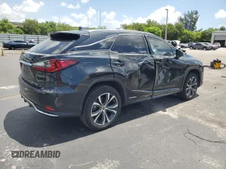2020 Lexus RX 450h with VIN 2T2HGMDA5LC055879, listed as a Copart auction lot 59871755 with 100,964 mi miles and Non repairable. Bid and sale history available at DreamBid. Image 3.