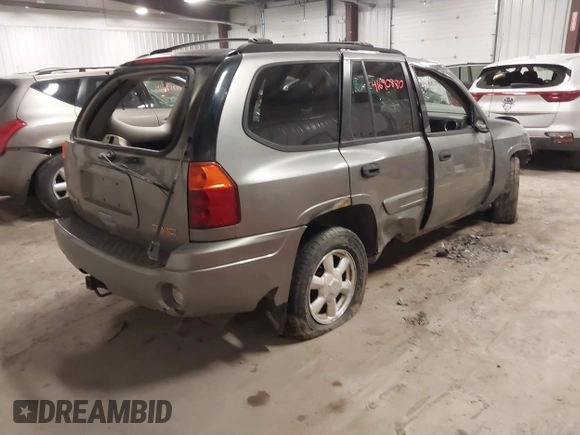2005 GMC Envoy SLT with VIN 1GKDT13S352257892, listed as a IAAI auction lot 41690880 with 134,216 mi miles. Bid and sale history available at carsss.com. Image 4.