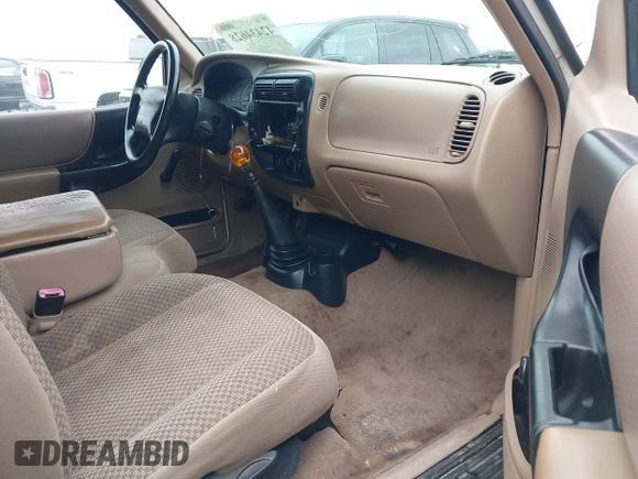 1999 Ford Ranger XL with VIN 1FTYR14V2XPA74414, listed as a IAAI auction lot 42434628 with 430,708 mi miles and . Bid and sale history available at DreamBid. Image 5.