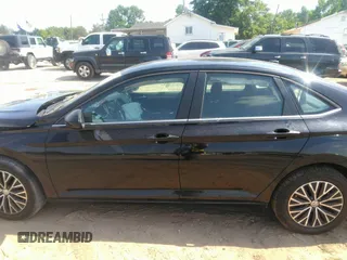 2021 Volkswagen Jetta S z VIN 3VWC57BU1MM038232, wystawiony jako IAAI lot #42196294 z przebiegiem 54 880 mil mil oraz . Historia ofert i sprzedaży dostępna na DreamBid. Obrazek 14.