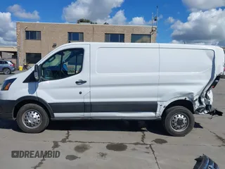 2021 Ford Transit Cargo with VIN 1FTBR2Y80MKA35393, listed as a IAAI auction lot 41732236 with 24,799 mi miles and . Bid and sale history available at DreamBid. Image 14.