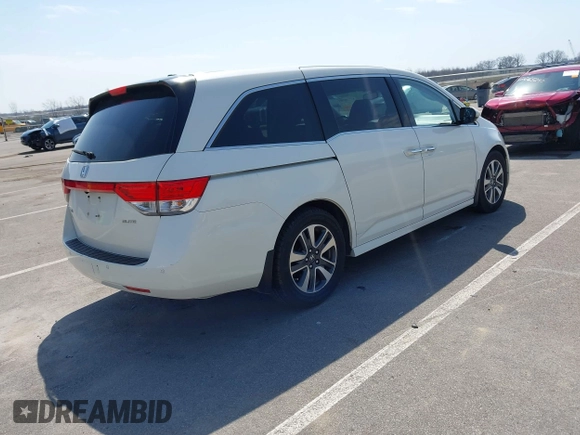 2016 Honda Odyssey Touring Elite with VIN 5FNRL5H97GB044278, listed as a IAAI auction lot 42056101 with 182,396 mi miles and . Bid and sale history available at DreamBid. Image 4.