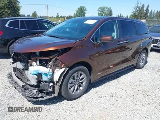 2021 Toyota Sienna XLE with VIN 5TDYSKFC9MS002567, listed as a IAAI auction lot 42162619 with 47,793 mi miles and . Bid and sale history available at DreamBid. Image 2.