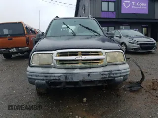 2003 Chevrolet Tracker z VIN 2CNBJ13C236901119, wystawiony jako Copart lot #68736774 z przebiegiem Nie podano mil oraz Szkoda całkowita • Salvage title. Historia ofert i sprzedaży dostępna na DreamBid. Obrazek 5.