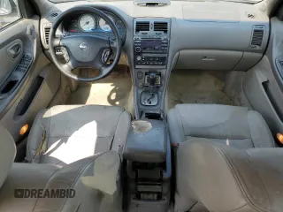 2002 Nissan Maxima GLE z VIN JN1DA31A62T000726, wystawiony jako Copart lot #71235864 z przebiegiem 219 647 mil mil oraz Szkoda całkowita • Salvage title. Historia ofert i sprzedaży dostępna na DreamBid. Obrazek 8.