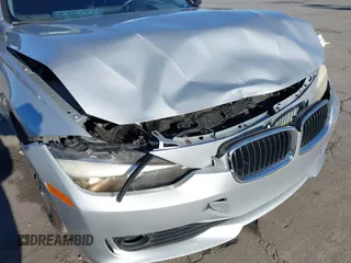 2015 BMW 3 Series 328i with VIN WBA3A5C57FF609054, listed as a IAAI auction lot 41330498 with 129,378 mi miles. Bid and sale history available at carsss.com. Image 6.