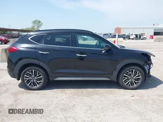 2021 Hyundai Tucson Ultimate with VIN KM8J33ALXMU289579, listed as a IAAI auction lot 42027719 with 95,989 mi miles and . Bid and sale history available at DreamBid. Image 13.