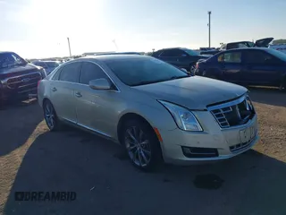 2014 Cadillac XTS with VIN 2G61L5S30E9207777, listed as a IAAI auction lot 41202654 with 112,565 mi miles. Bid and sale history available at carsss.com. Image 13.