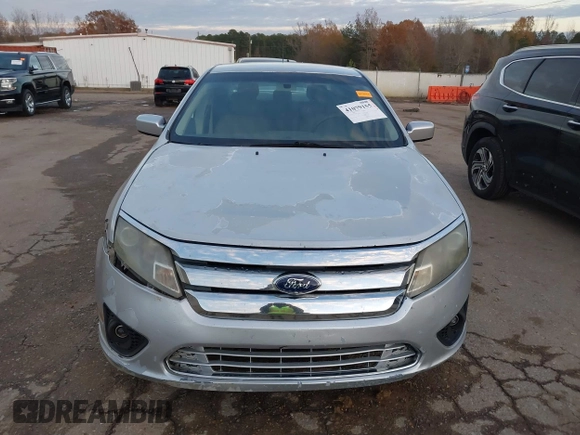 2012 Ford Fusion SE z VIN 3FAHP0HA4CR213409, wystawiony jako IAAI lot #41079155 z przebiegiem 139 129 mil mil oraz . Historia ofert i sprzedaży dostępna na DreamBid. Obrazek 11.