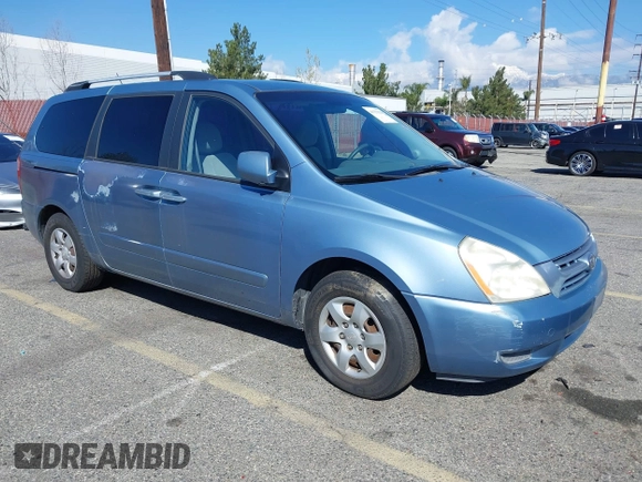 2009 Kia Sedona LX with VIN KNDMB233396300879, listed as a IAAI auction lot 41753122 with 183,754 mi miles. Bid and sale history available at carsss.com. Image 1.