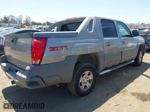 2002 Chevrolet Avalanche z VIN 3GNEC13T62G131044, wystawiony jako IAAI lot #42304494 z przebiegiem 378 090 mil mil oraz . Historia ofert i sprzedaży dostępna na DreamBid. Obrazek 4.