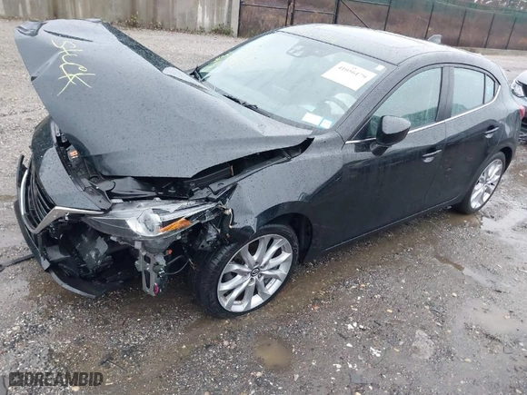 2014 Mazda Mazda3 s Grand Touring with VIN JM1BM1M31E1182946, listed as a IAAI auction lot 41056179 with NaN miles. Bid and sale history available at carsss.com. Image 2.