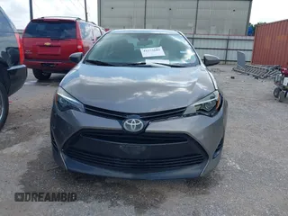 2018 Toyota Corolla L z VIN 5YFBURHE1JP855556, wystawiony jako IAAI lot #42273685 z przebiegiem 165 792 mil mil oraz . Historia ofert i sprzedaży dostępna na DreamBid. Obrazek 12.