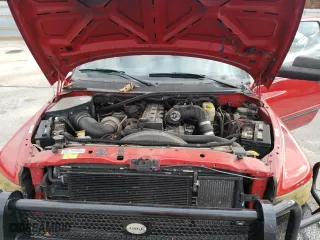 2002 Dodge Ram 3500 with VIN 3B7MF33652M205850, listed as a Copart auction lot 76749504 with 220,734 mi miles and Salvage Title. Bid and sale history available at carsss.com. Image 12.