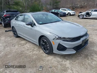 2024 Kia K5 GT-Line z VIN 5XXG64J26RG262623, wystawiony jako IAAI lot #41857220 z przebiegiem 25 235 mil mil oraz . Historia ofert i sprzedaży dostępna na DreamBid. Obrazek 1.