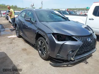 2021 Lexus UX with VIN JTHP9JBH1M2040593, listed as a IAAI auction lot 42024493 with 33,394 mi miles. Bid and sale history available at carsss.com. Image 1.