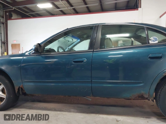2003 Oldsmobile Alero GL1 with VIN 1G3NL52F13C204109, listed as a IAAI auction lot 42084040 with Not Provided miles and . Bid and sale history available at DreamBid. Image 15.
