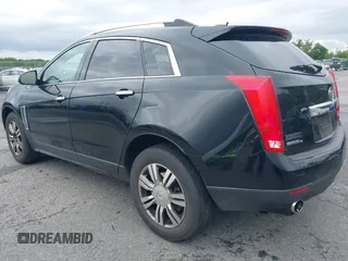 2015 Cadillac SRX Luxury Collection z VIN 3GYFNEE34FS510360, wystawiony jako IAAI lot #42343737 z przebiegiem 149 046 mil mil oraz . Historia ofert i sprzedaży dostępna na DreamBid. Obrazek 3.