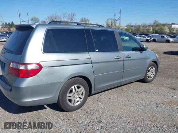 2007 Honda Odyssey EX-L with VIN 5FNRL38787B019019, listed as a IAAI auction lot 41974224 with 170,706 mi miles. Bid and sale history available at carsss.com. Image 4.