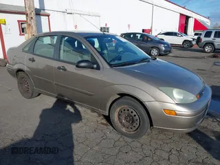 2004 Ford Focus SE with VIN 1FAFP34354W167961, listed as a IAAI auction lot 41545304 with 128,560 mi miles and . Bid and sale history available at DreamBid. Image 1.