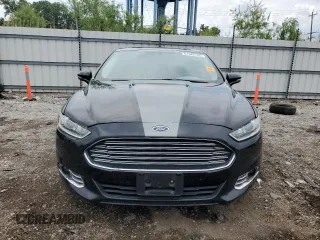 2016 Ford Fusion SE with VIN 3FA6P0T98GR163785, listed as a Copart auction lot 61542735 with 112,776 mi miles and Salvage title. Bid and sale history available at DreamBid. Image 5.