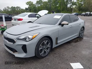 2021 Kia Stinger GT-Line with VIN KNAE15LA6M6091313, listed as a IAAI auction lot 41409011 with 34,356 mi miles. Bid and sale history available at carsss.com. Image 2.