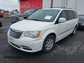 2013 Chrysler Town & Country Touring with VIN 2C4RC1BG7DR629829, listed as a IAAI auction lot 42152230 with 188,473 mi miles. Bid and sale history available at carsss.com. Image 2.