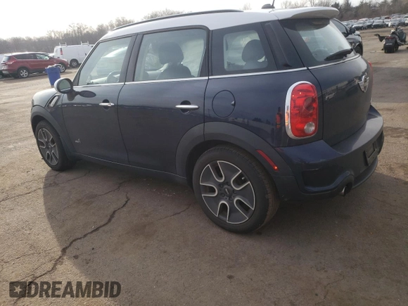 2012 MINI Countryman S with VIN WMWZC5C55CWL64092, listed as a Copart auction lot 50703855 with 69,785 mi miles and Salvage Title. Bid and sale history available at DreamBid. Image 2.